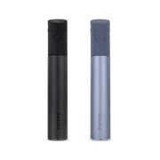 Two Puffco Pivot Vaporizers, one black and one blue, standing upright.