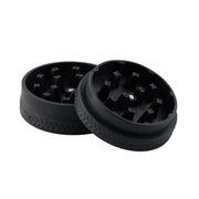 Close-up of 55mm OCB grinder with smooth teeth and durable design