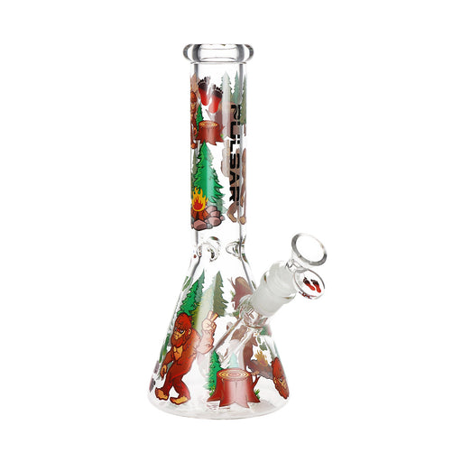 Pulsar Grumpy Bigfoot Beaker Bong front view 10" clear borosilicate glass beaker with full-wrap Bigfoot forest decal, campfire scene, and 14mm herb slide
